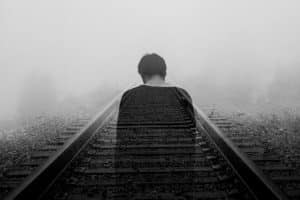 man on railway committing suicide